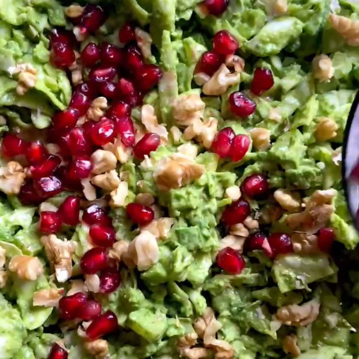 Top with pomegranates and walnuts.