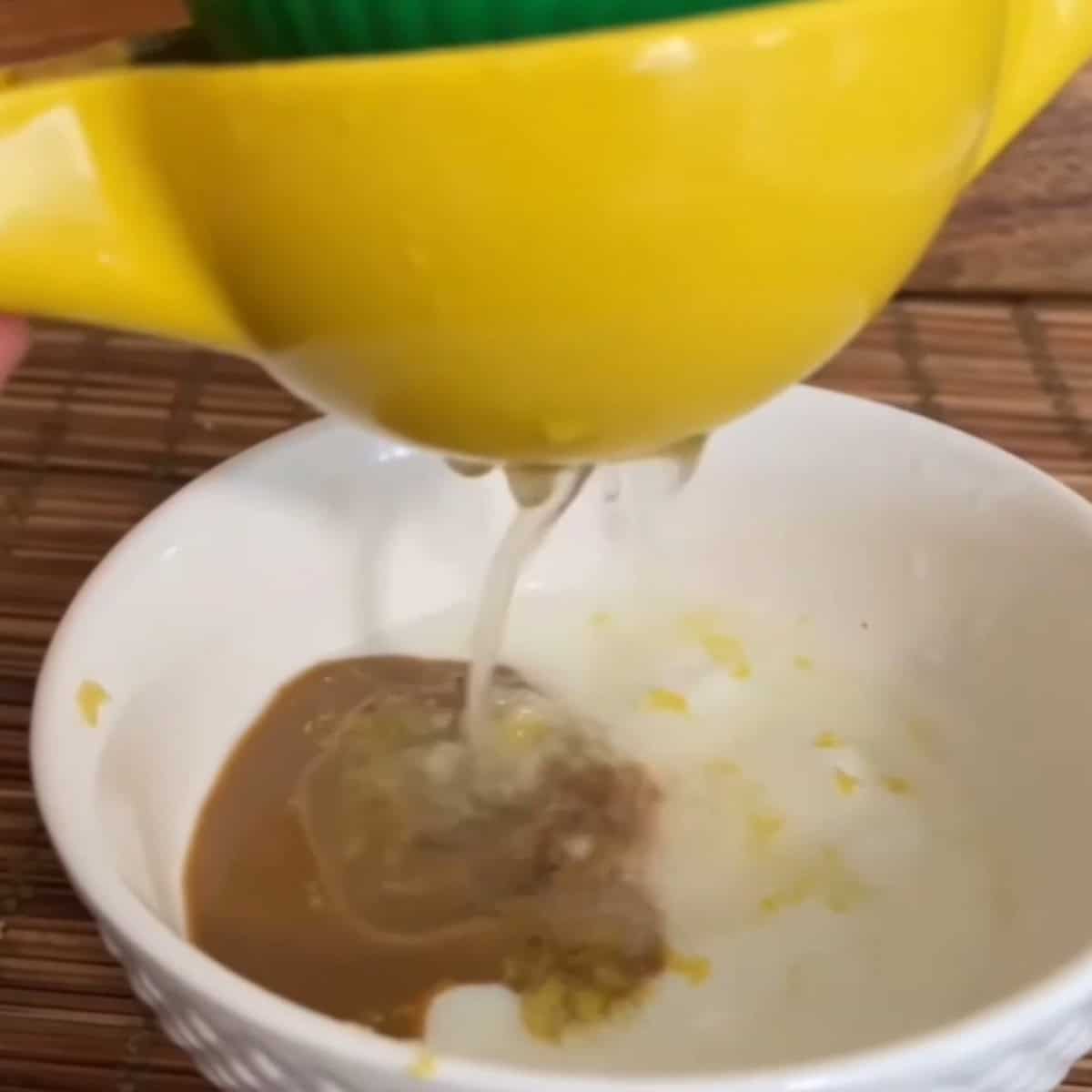 Add lemon juice to yogurt and tahini.