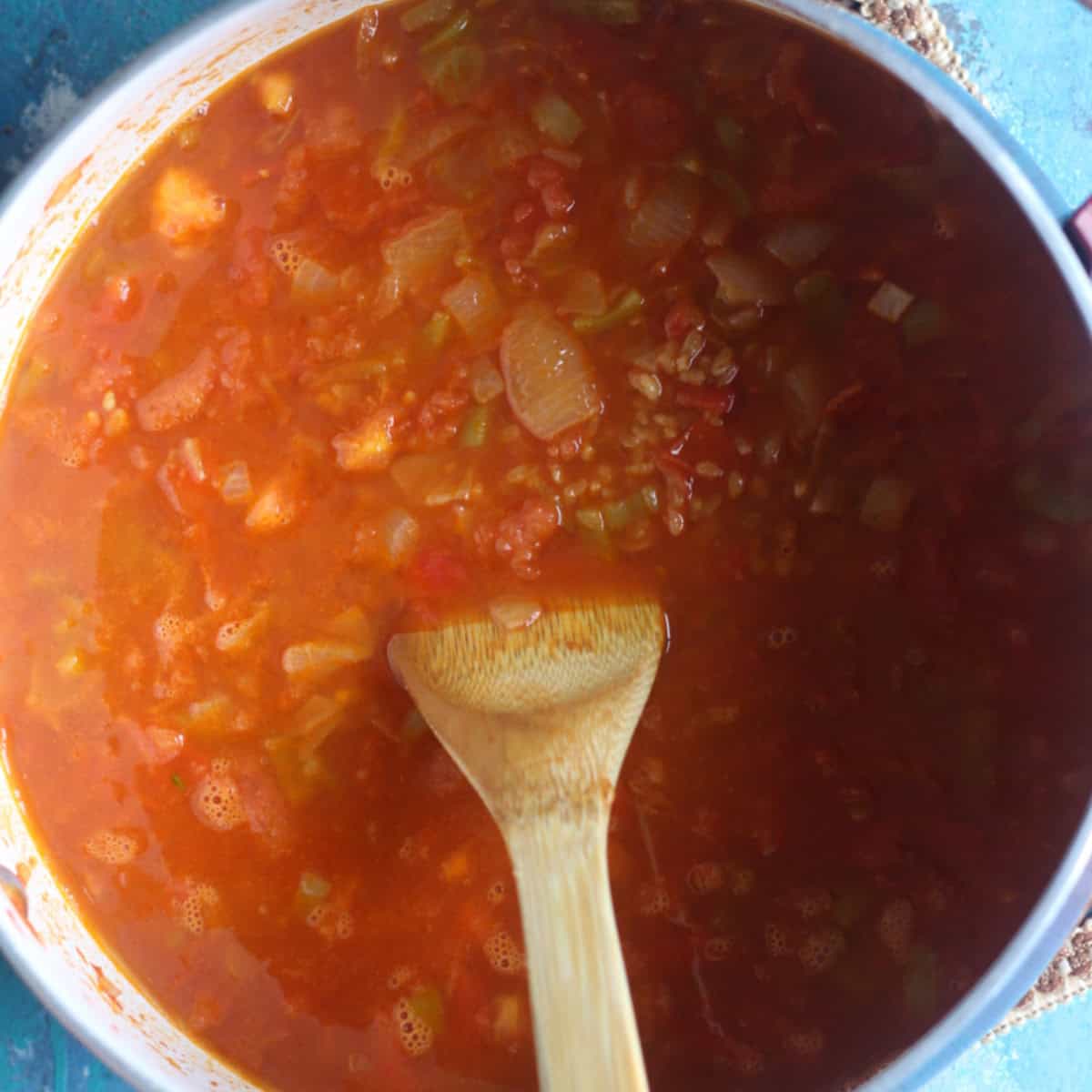 Add water and bring to a simmer. 