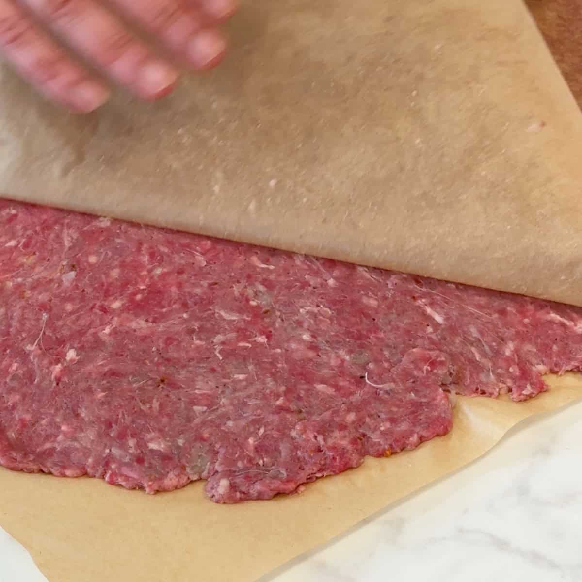 Roll out and remove the top parchment.