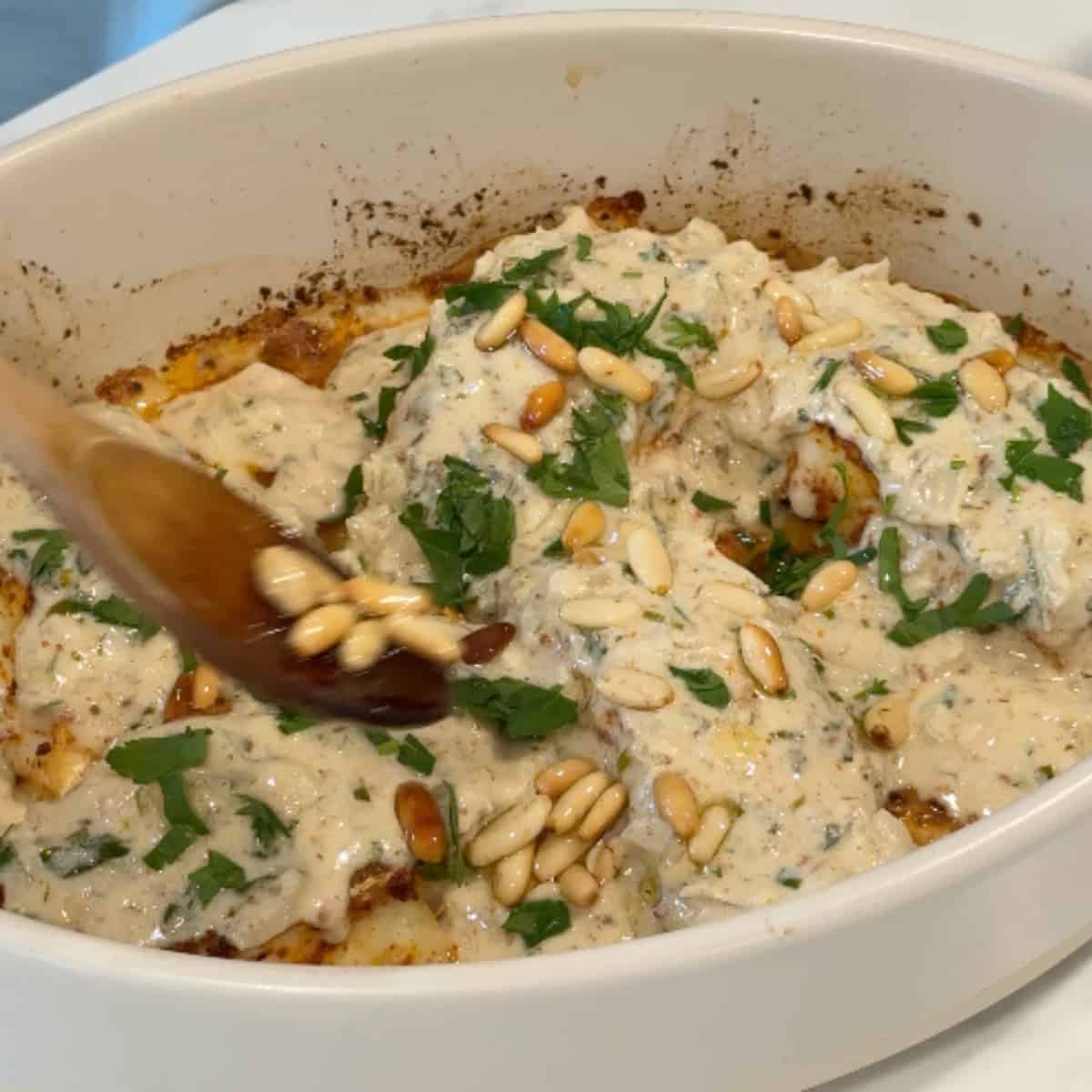 Top with cilantro and pine nuts. 