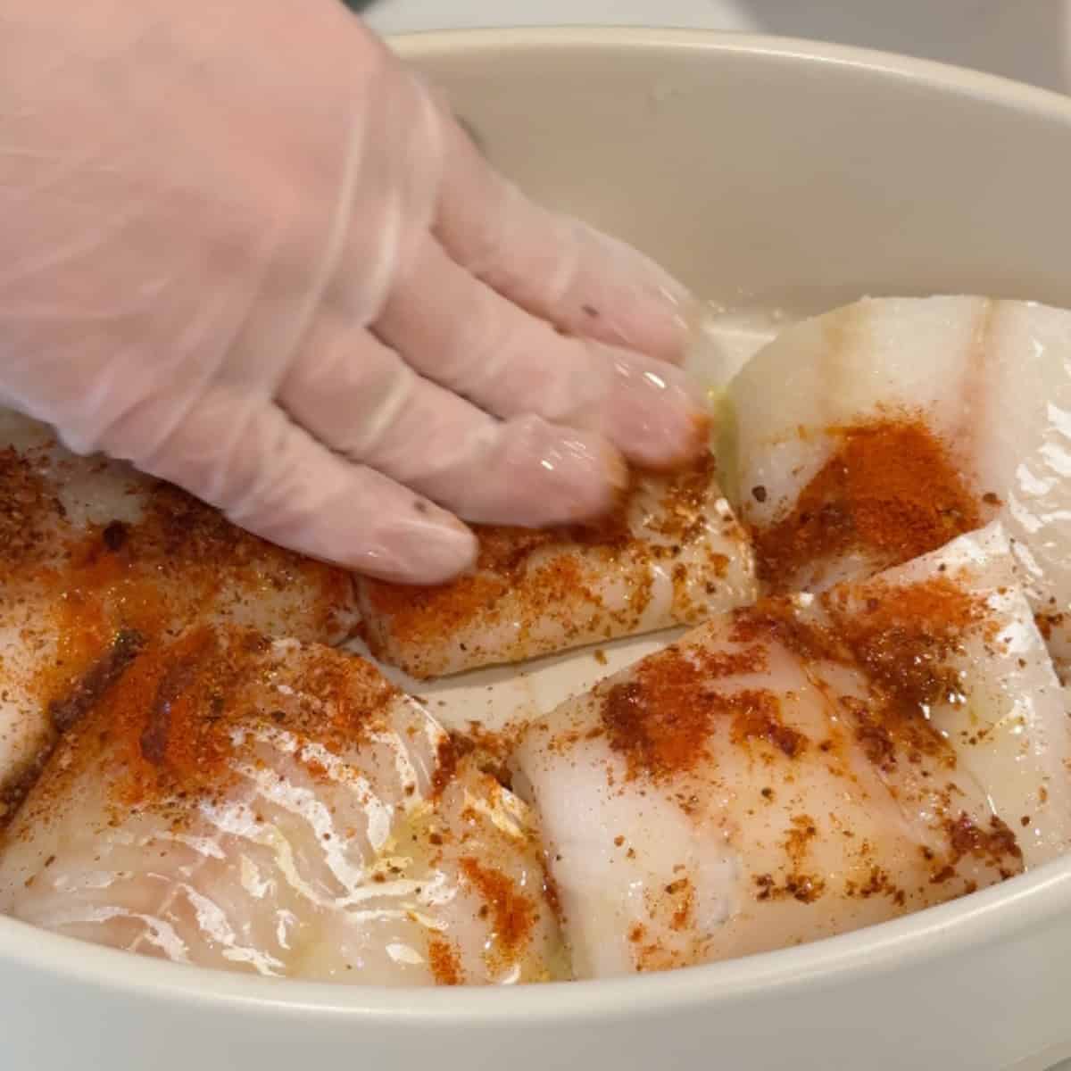 rub the spices and olive oil on the cod. 
