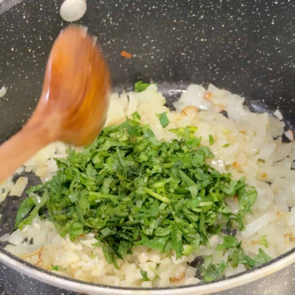 Add in the garlic and cilnatro