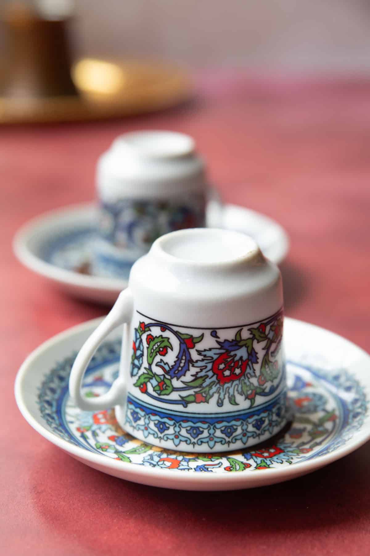 Flipped coffee cups for fortune reading.