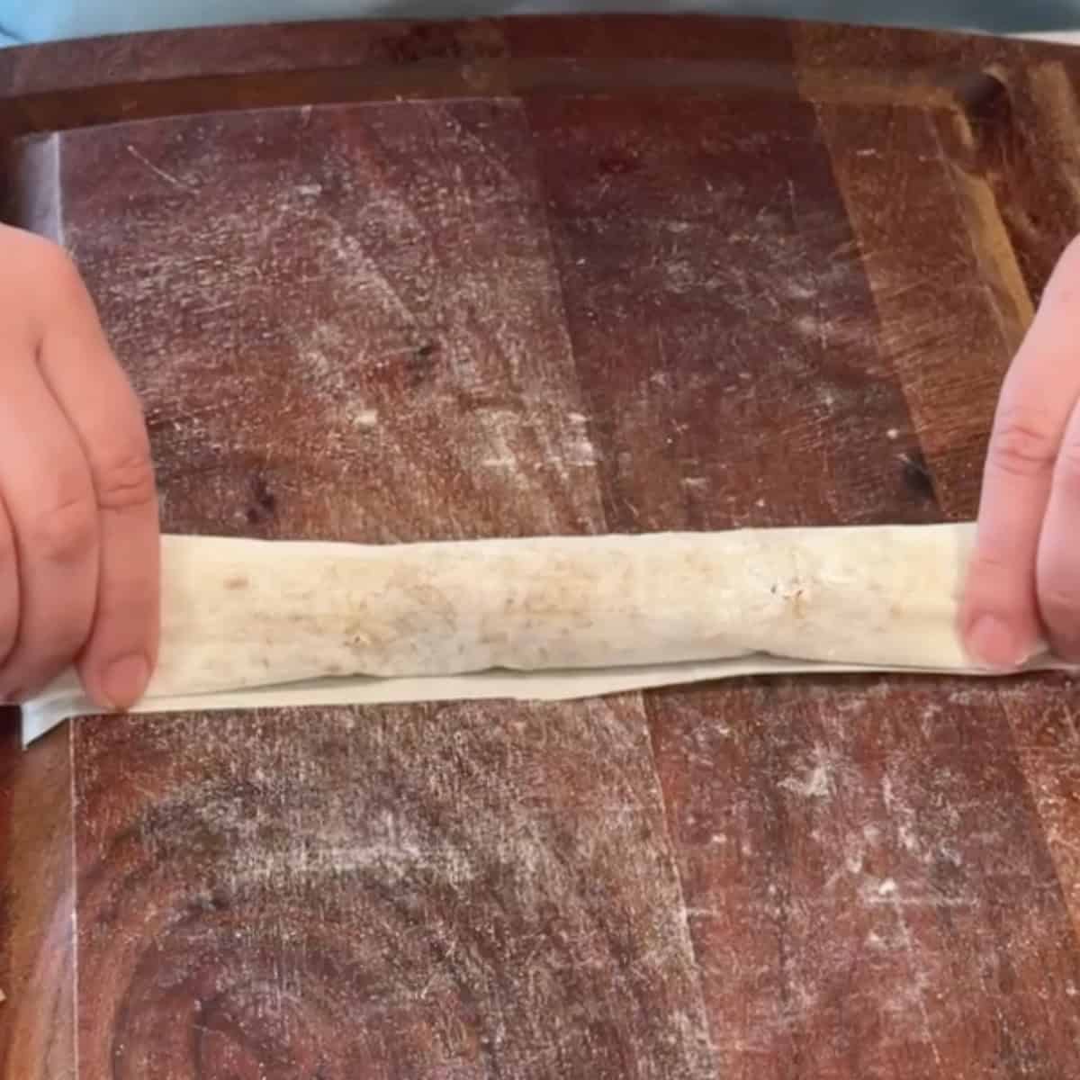 Roll tightly with the dowel.