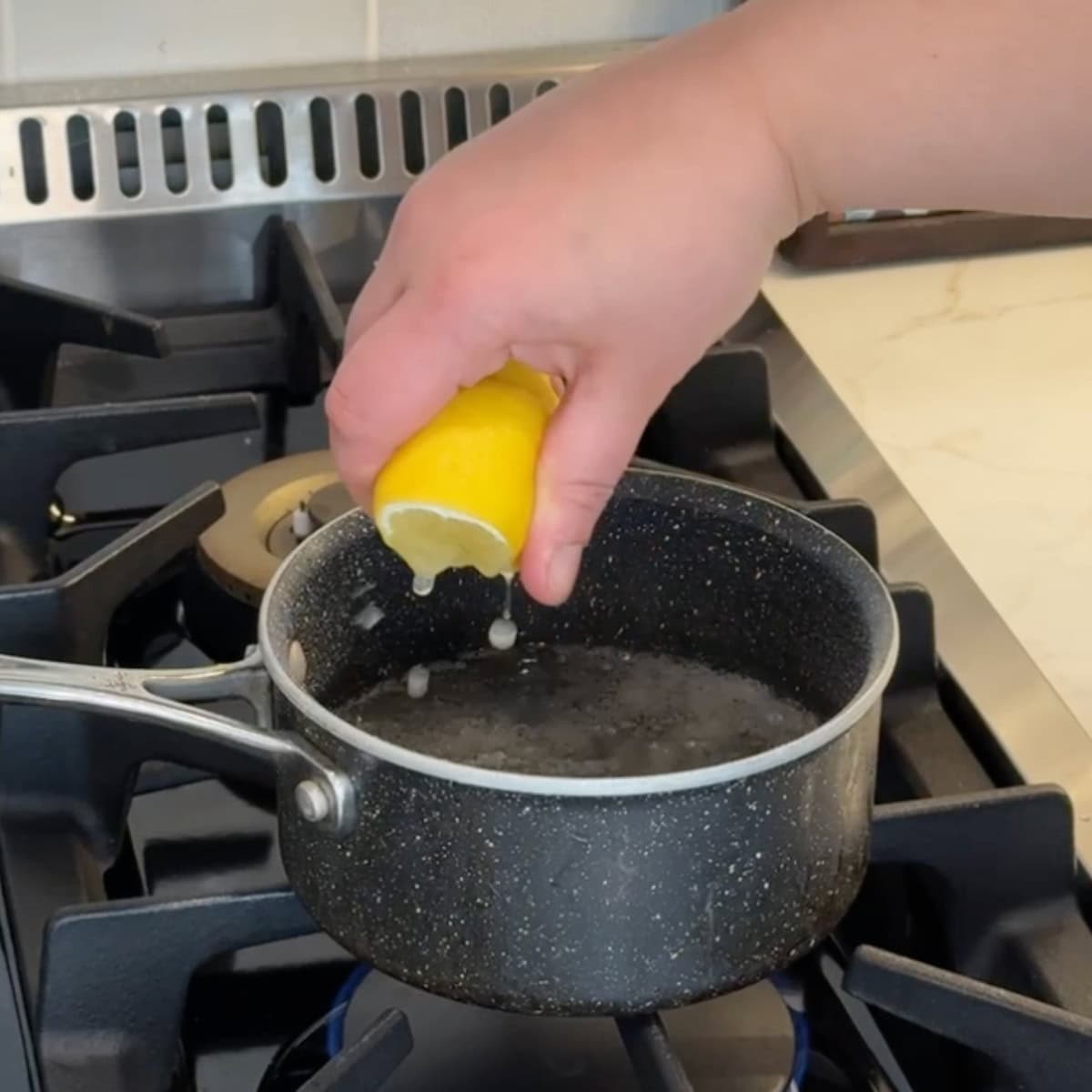 Once the syrup is ready, turn the heat off and add the lemon juice. 
