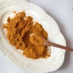 Fish seasoning on a white plate.