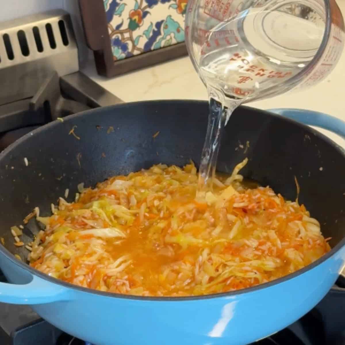 Add the water and cook. 