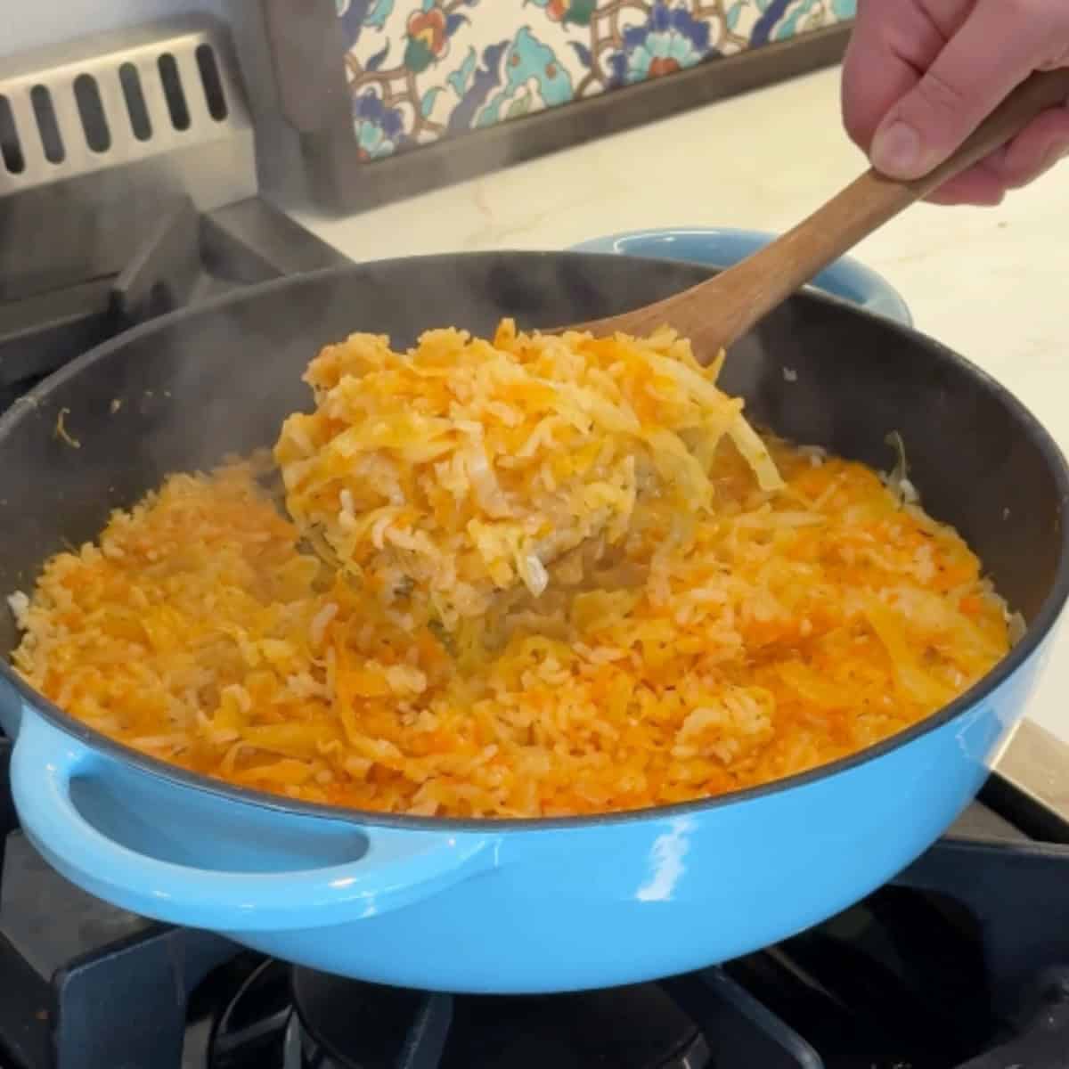 Let the rice rest and then serve. 