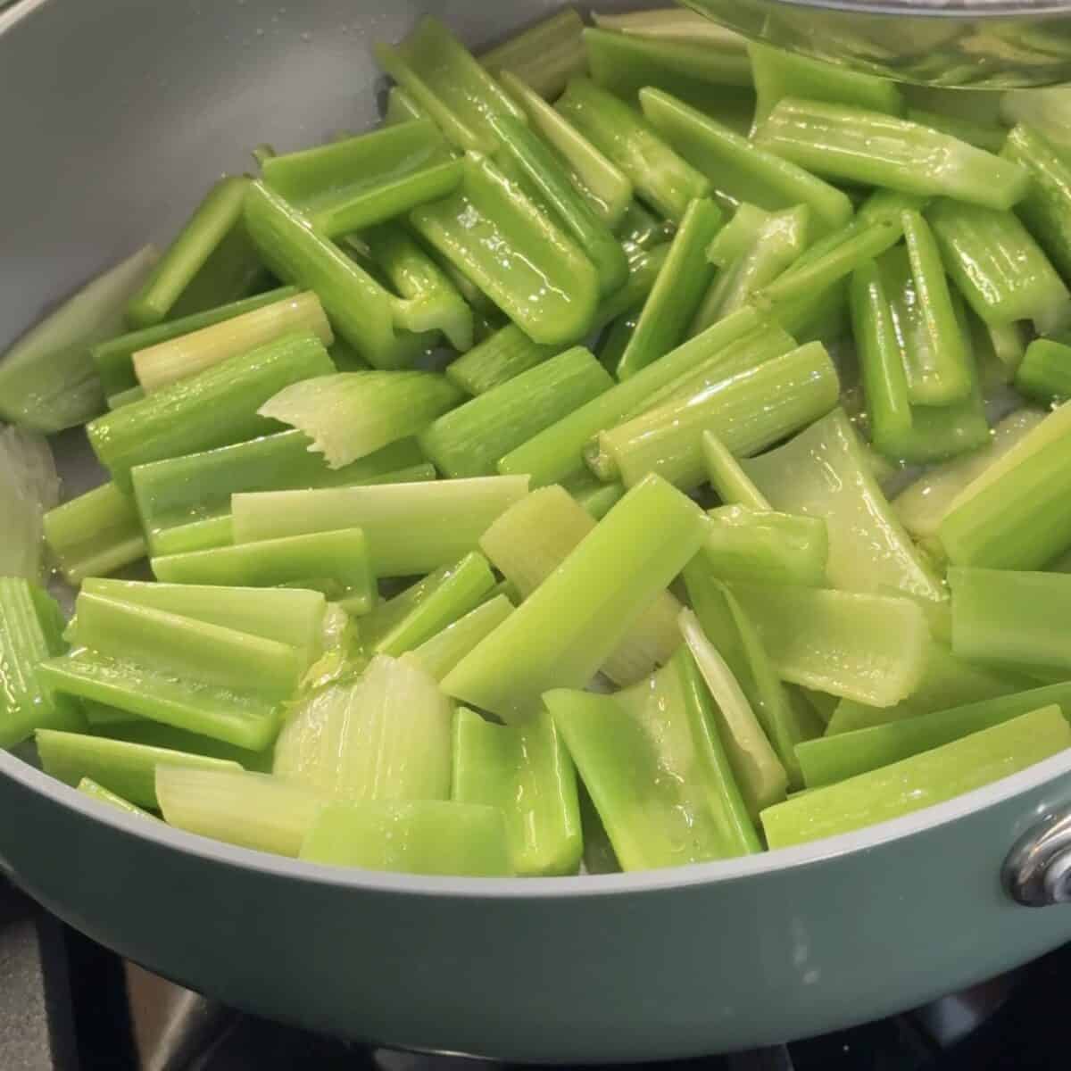 Saute the celery in olive oil. 
