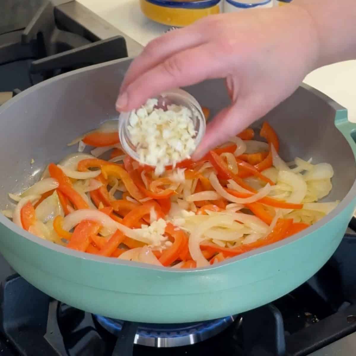 Saute onion and pepper then add the garlic. 