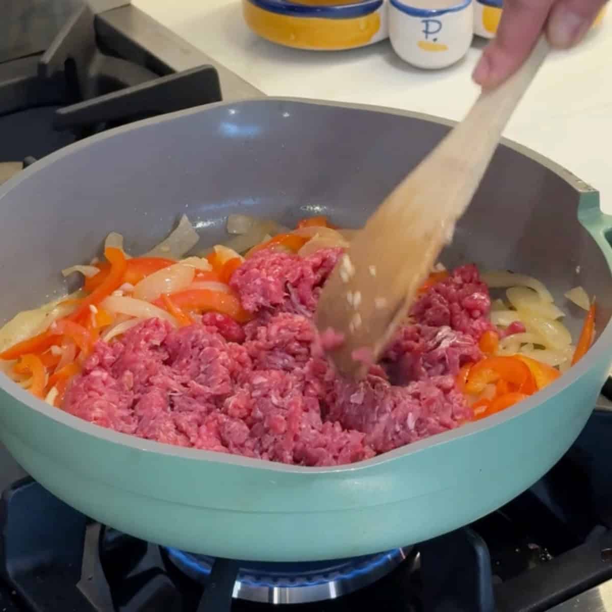Add the ground beef and brown it. 