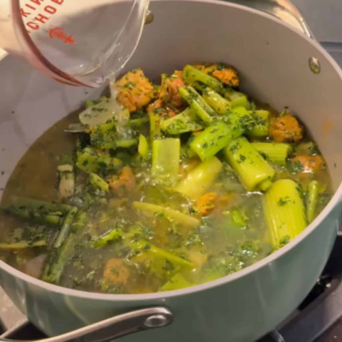 Add water to the lamb and celery. 