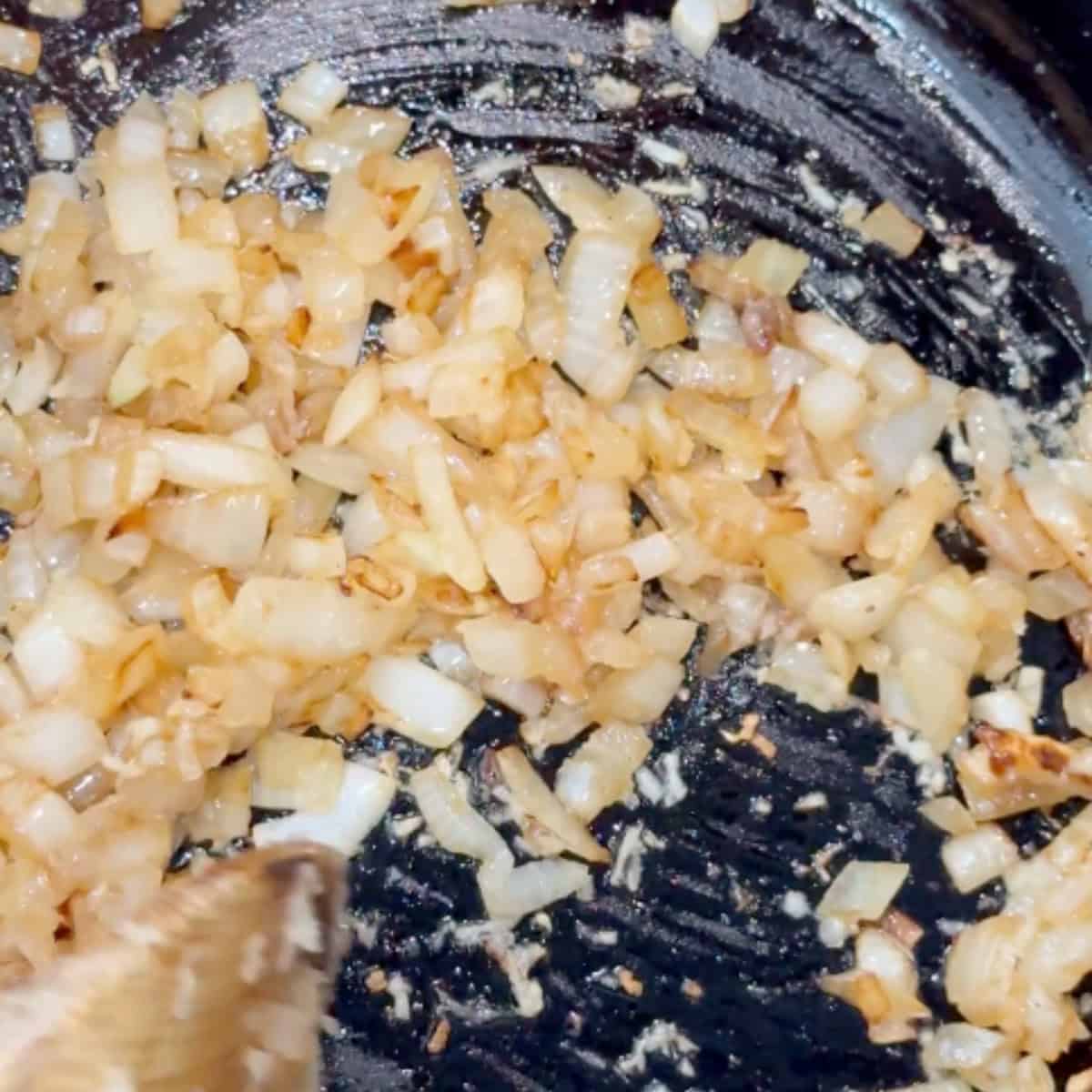Saute the onion and garlic,