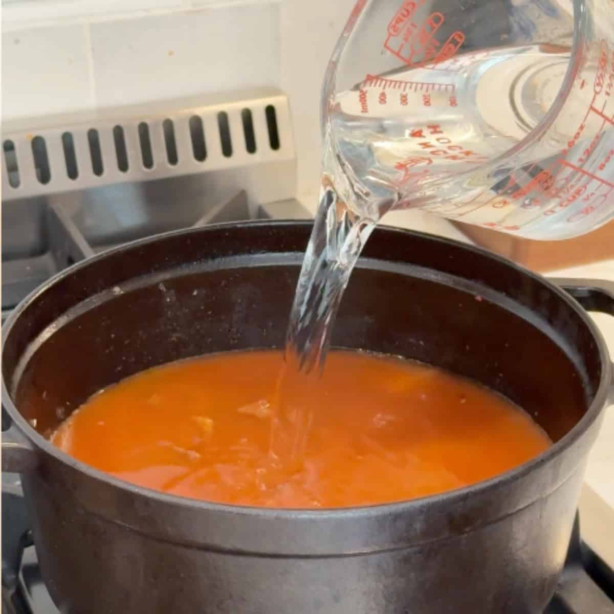 Add water and cook until the beef is tender.