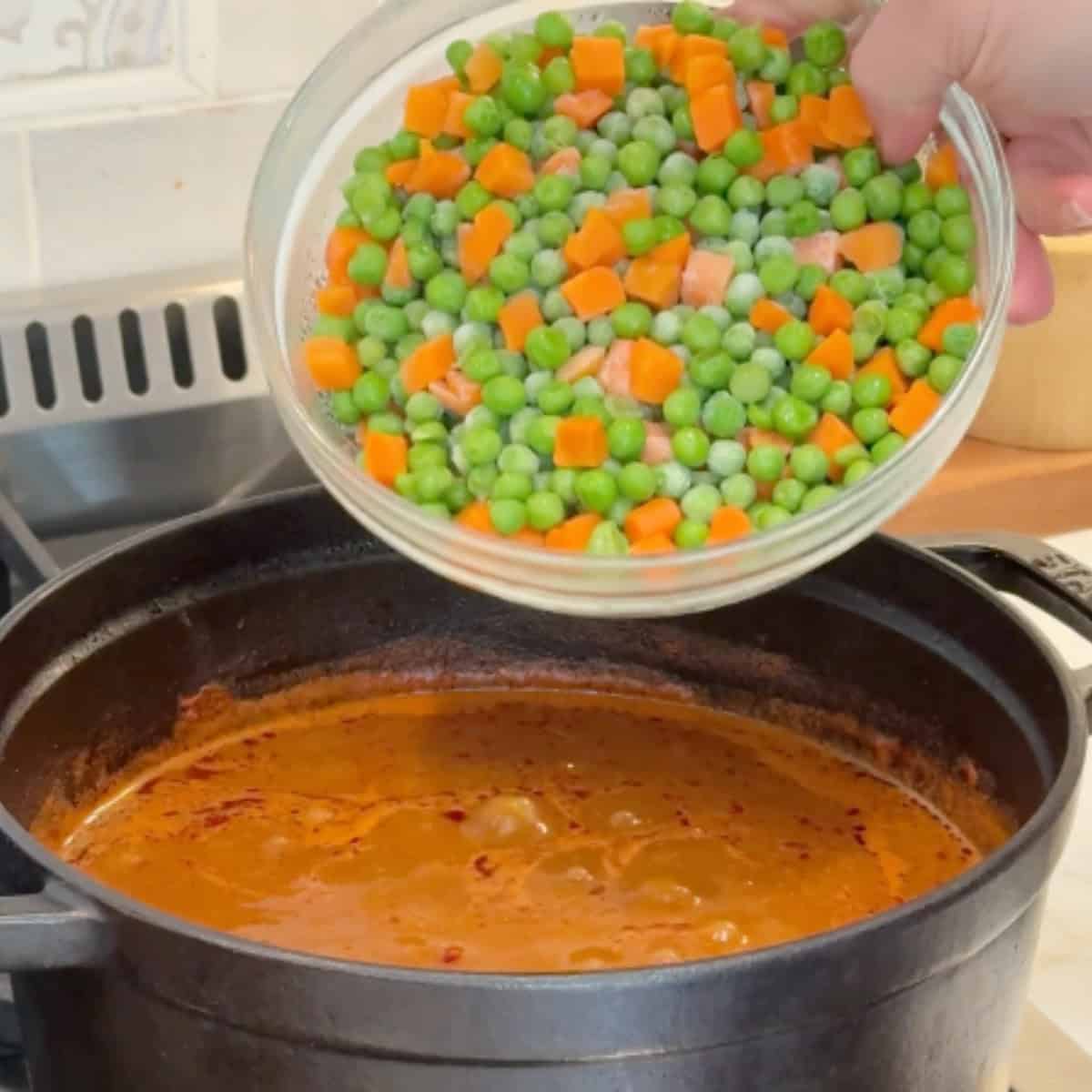 Add in the peas and carrots