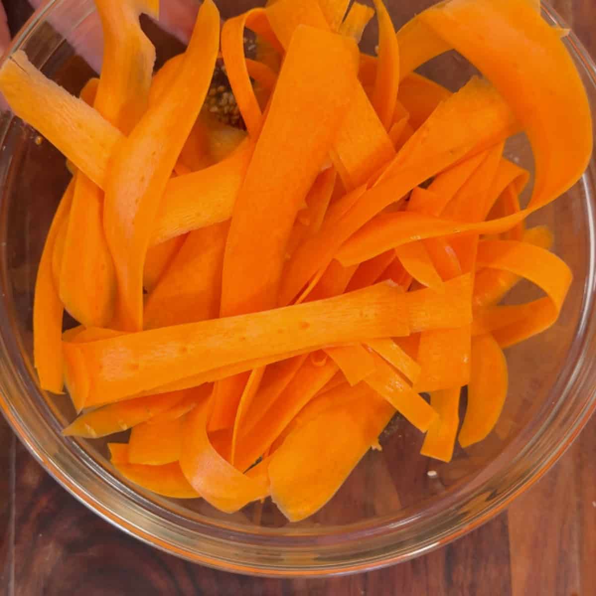 Add the carrot ribbons