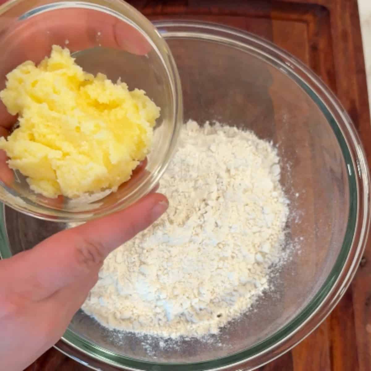 Add ghee to the flour.