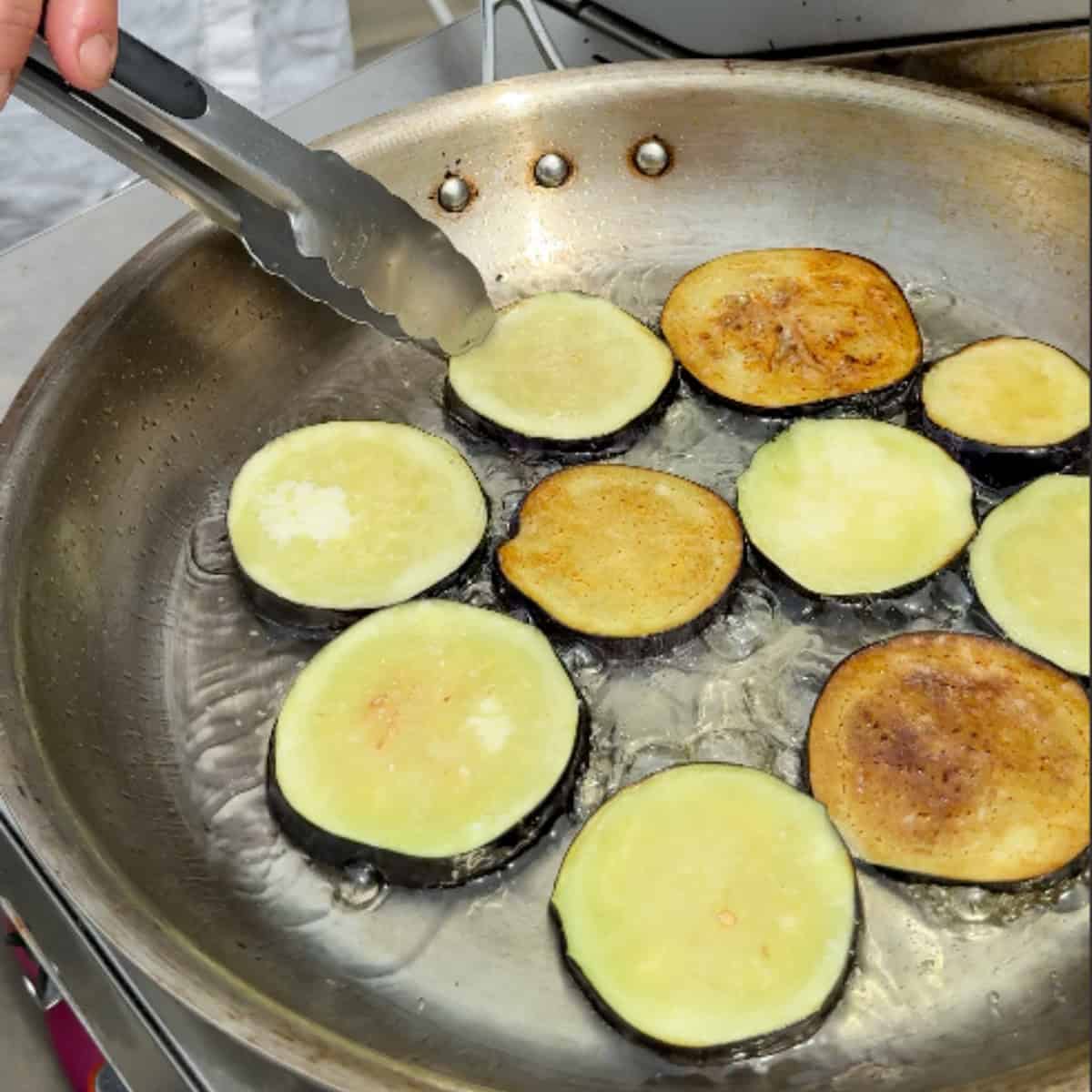 Fry eggplants on both sides.