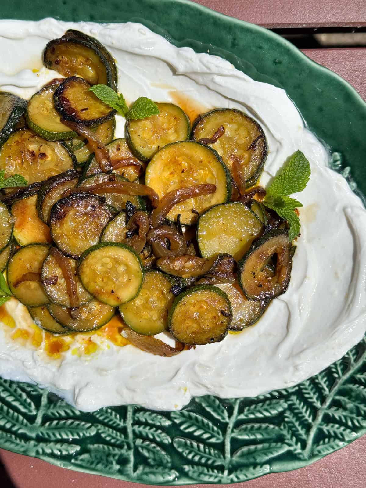 sauteed zucchini on yogurt.