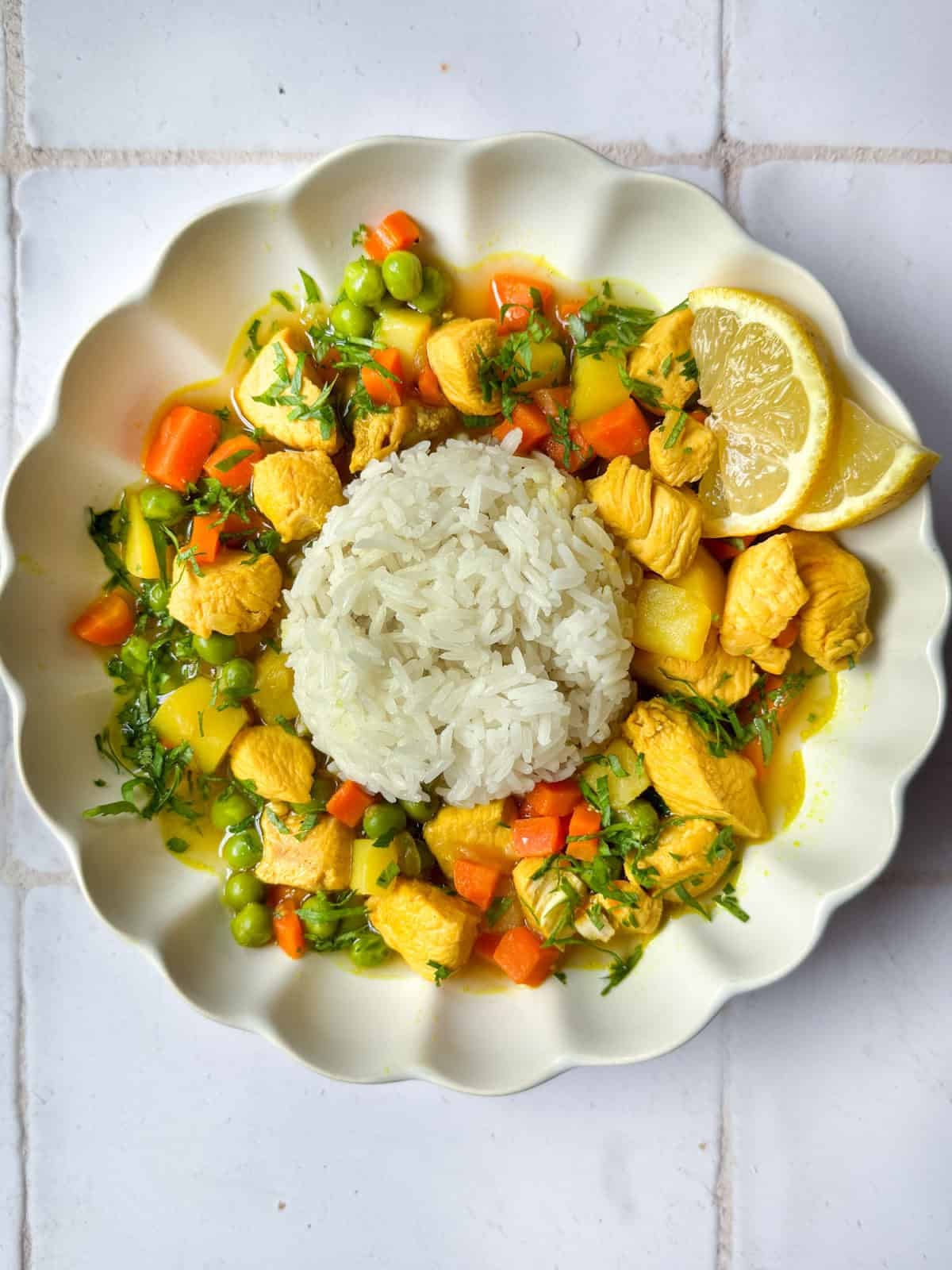 Turmeric chicken soup with rice in a bowl 