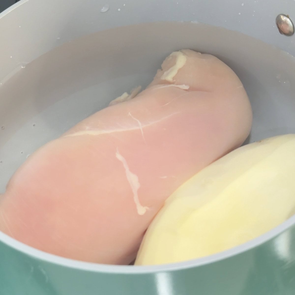 cook the chicken and potato in a saucepan