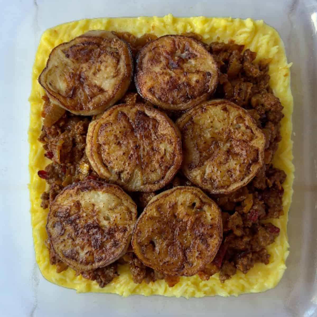 Top with the filling and eggplants